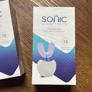 Never opened! Sonic glow teeth